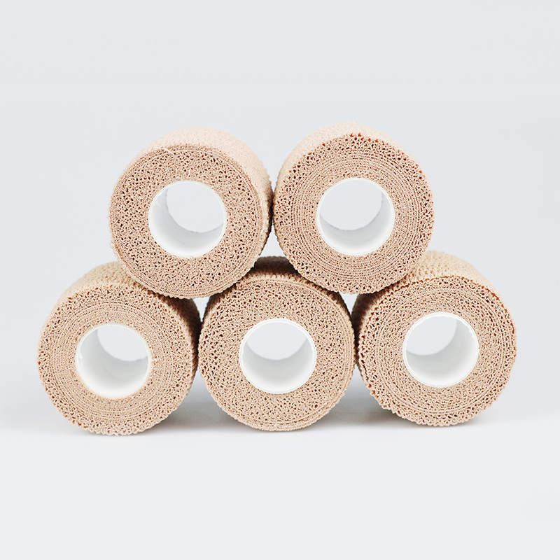 Bandage en coton auto-adhésif élastique facile à déchirer